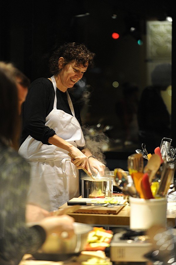 Chefs working together in a professional kitchen